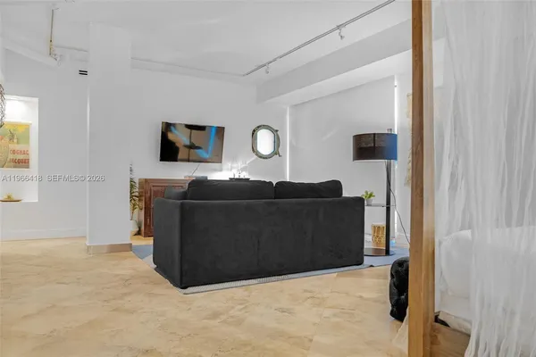 a room with a table and chairs