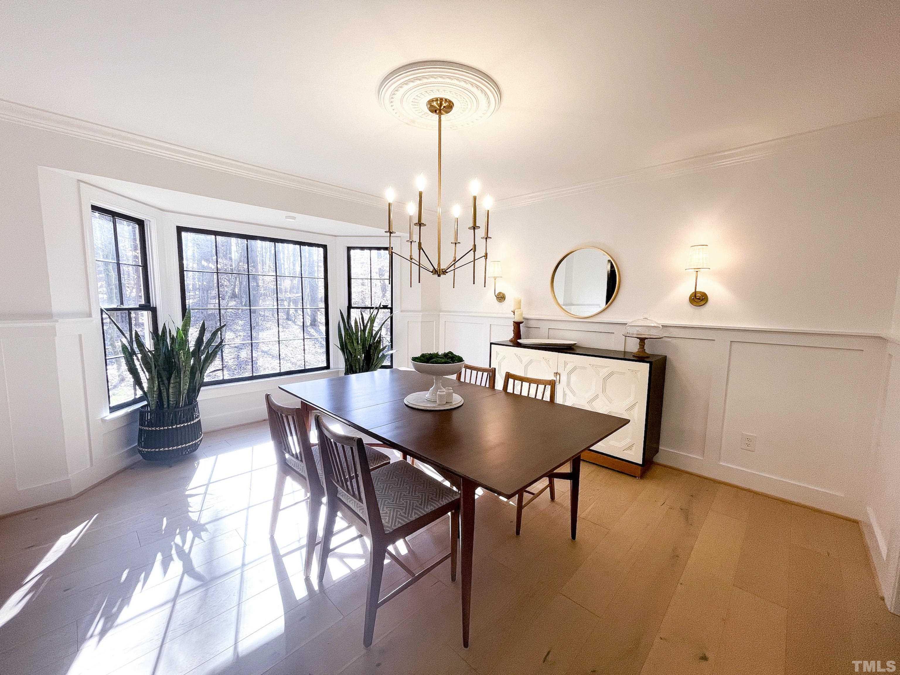 5025 Red Cedar Road Raleigh, NC 27613 - Photo 46 of 75 a view of a dining room with furniture and window