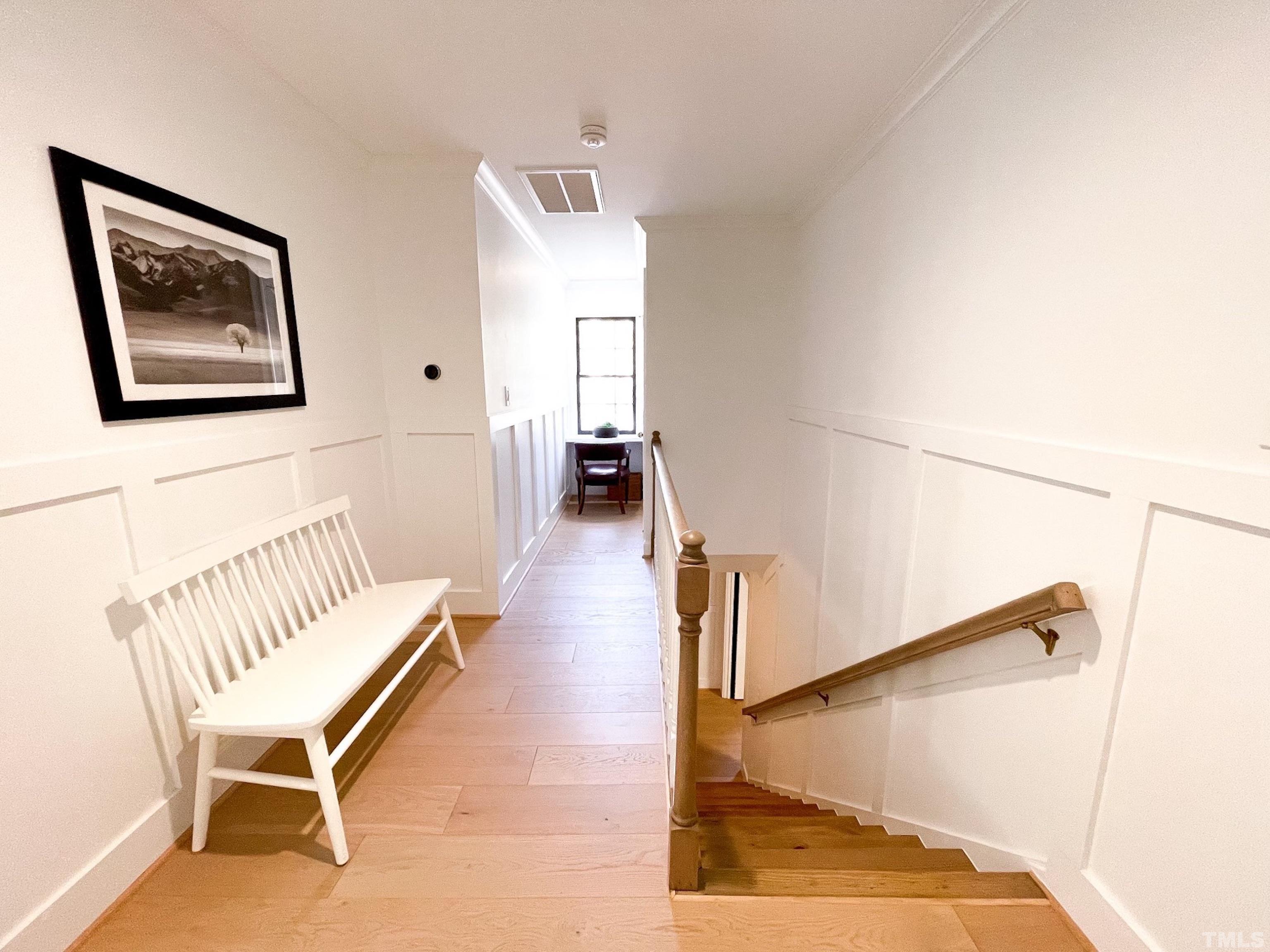 5025 Red Cedar Road Raleigh, NC 27613 - Photo 48 of 75 a view of staircase with furniture and a window