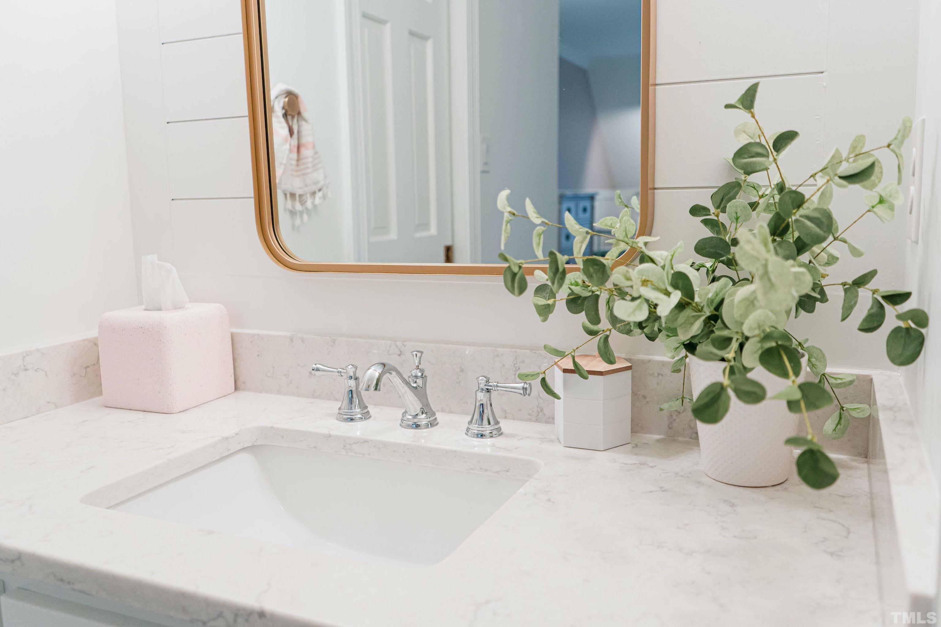 5025 Red Cedar Road Raleigh, NC 27613 - Photo 55 of 75 a bathroom with a sink a toilet and a mirror