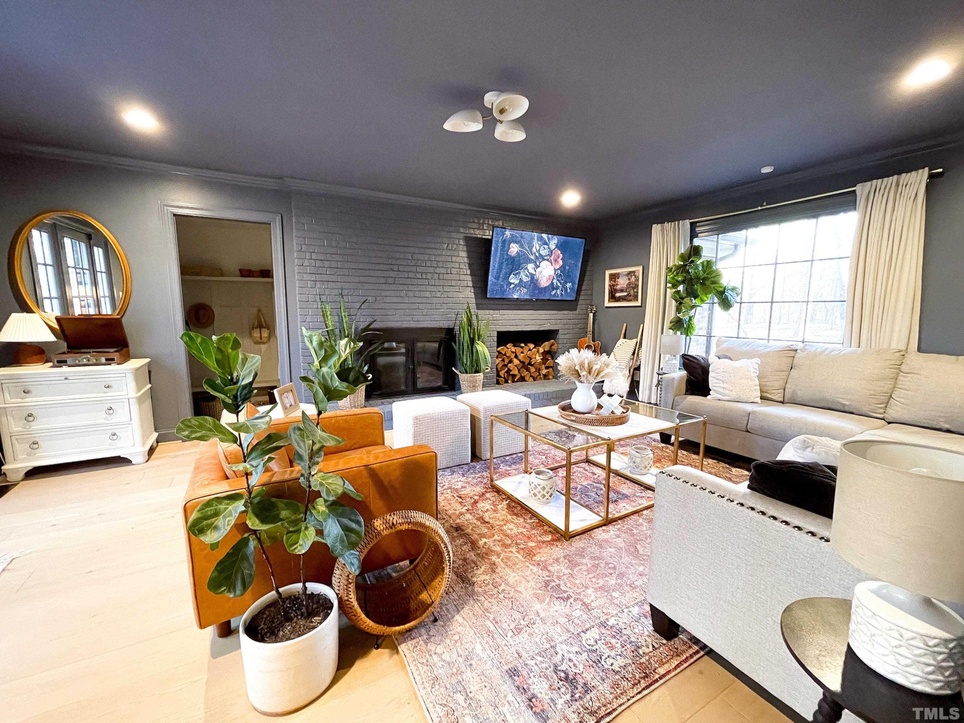 5025 Red Cedar Road Raleigh, NC 27613 - Photo 58 of 75 a living room with furniture and a large window