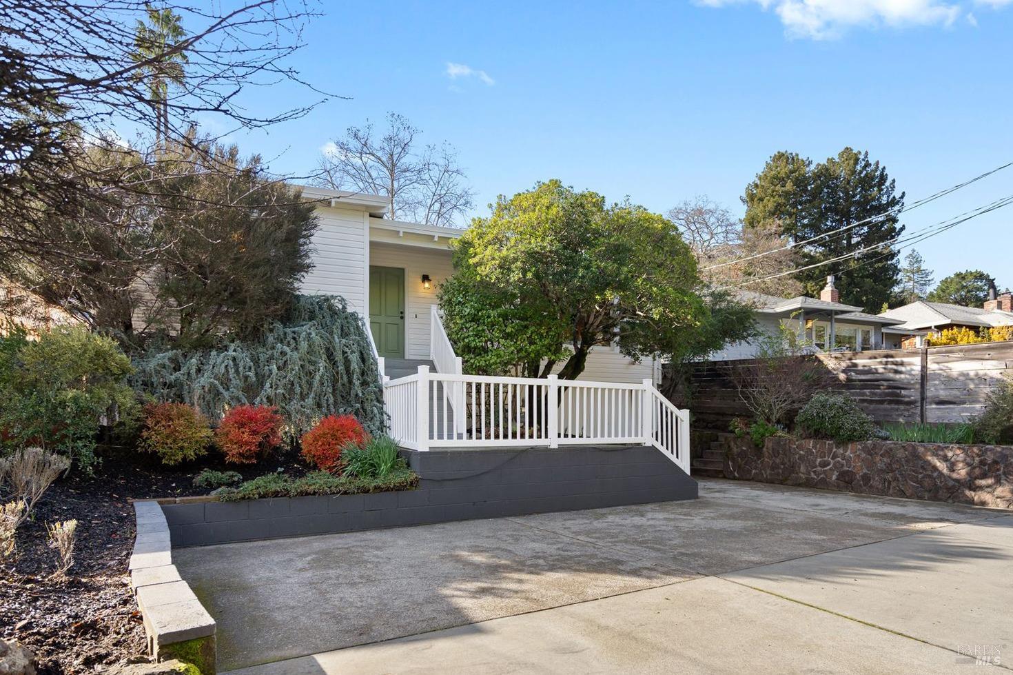 203 Butterfield Road San Anselmo, CA 94960 - Photo 1 of 1 a view of a garden with potted plants