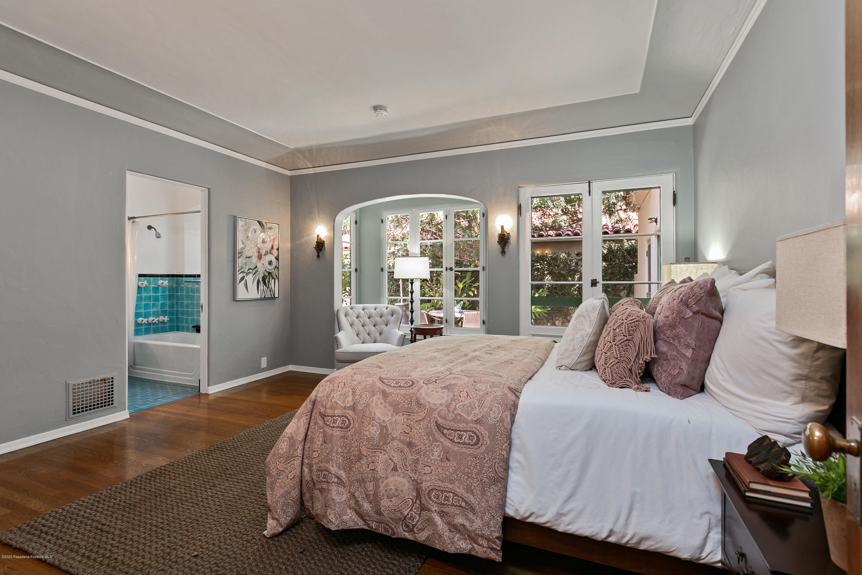 1691 Meadowbrook Road Altadena, CA 91001 - Photo 19 of 35 a bedroom with a large bed and a large window