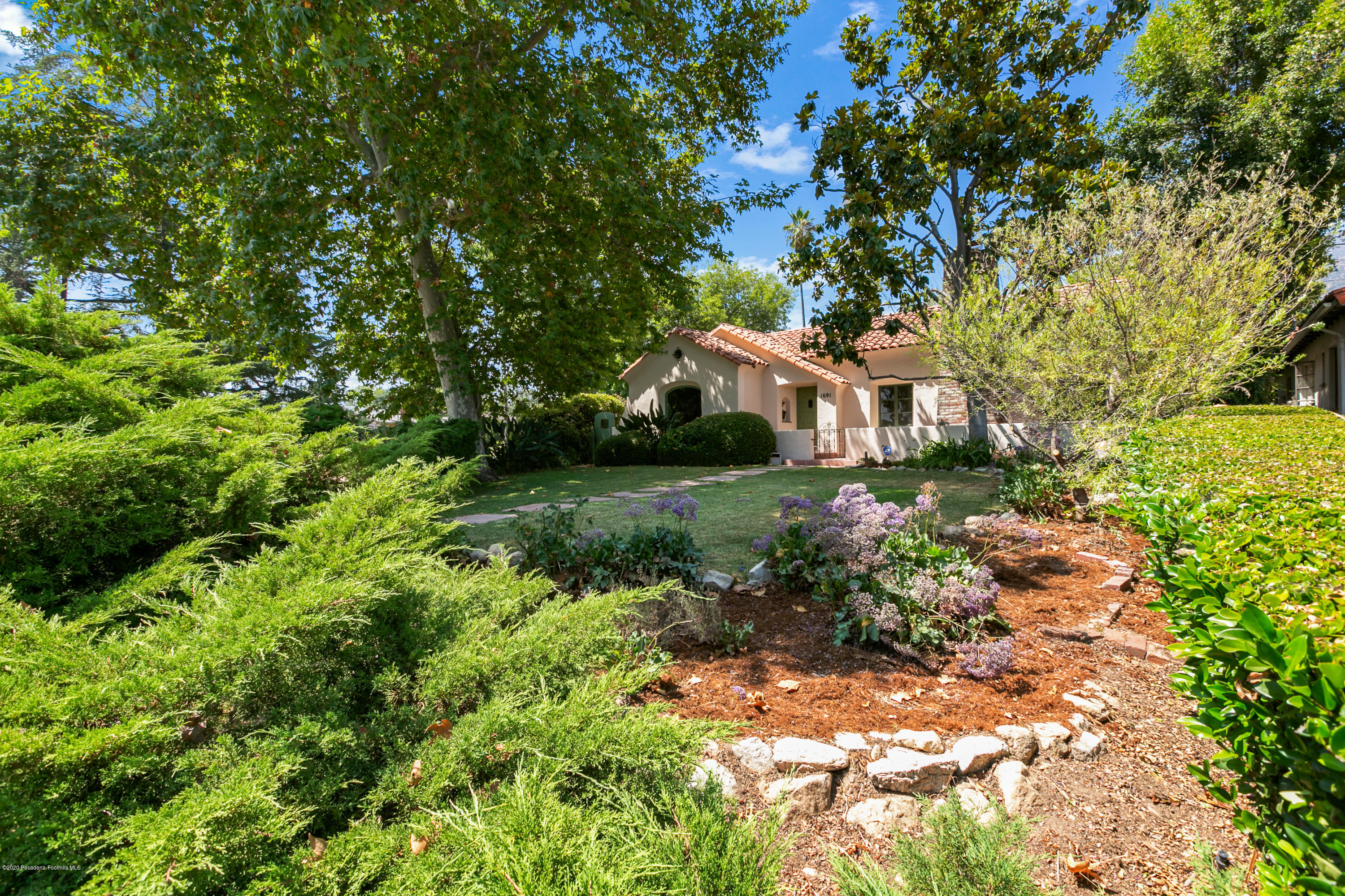 1691 Meadowbrook Road Altadena, CA 91001 - Photo 3 of 35 a house view with a garden space