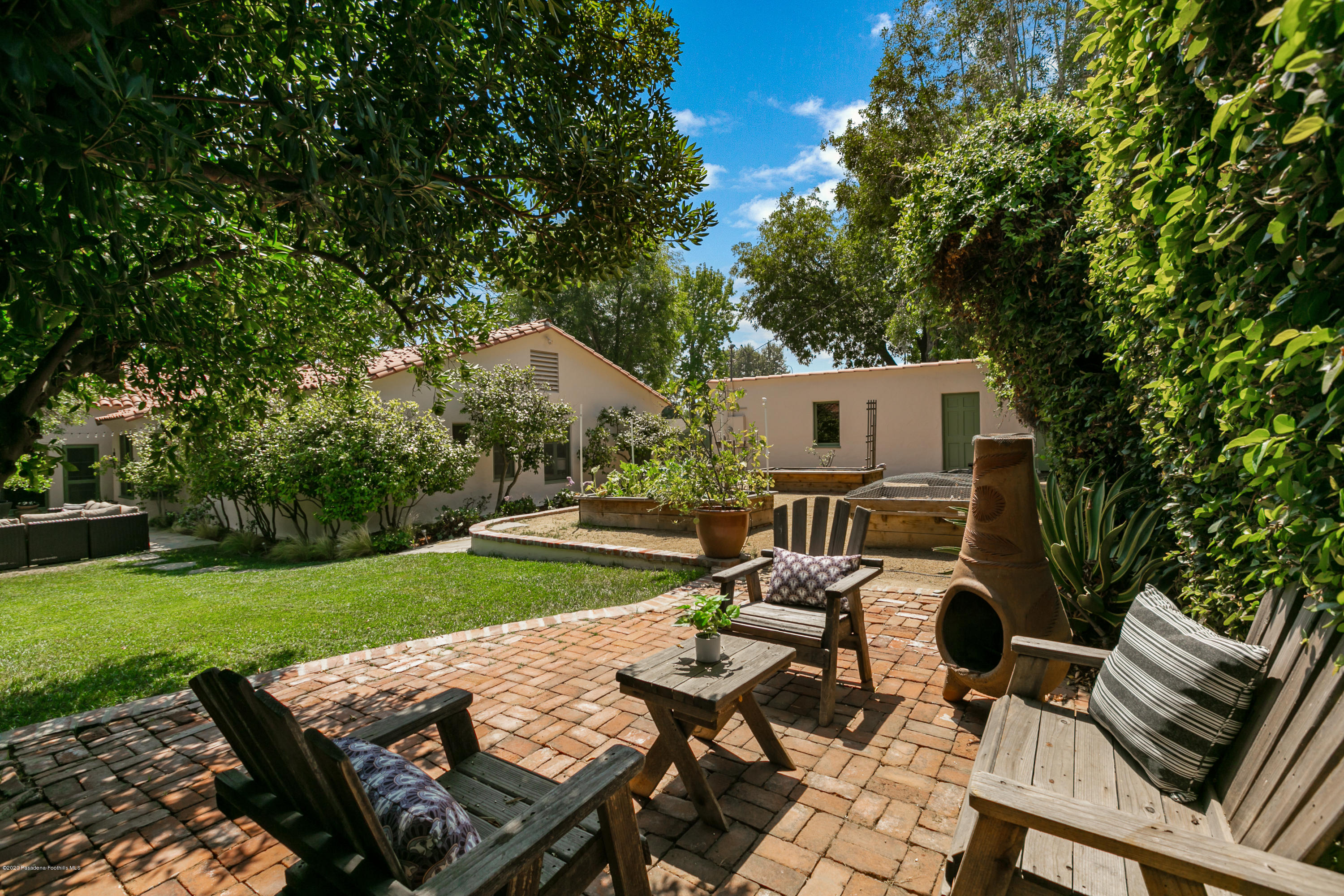 1691 Meadowbrook Road Altadena, CA 91001 - Photo 34 of 35 a view of a patio with table and chairs a barbeque