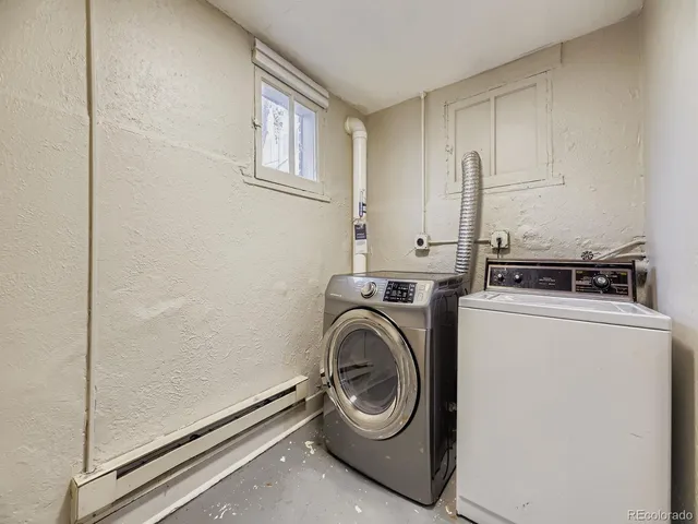 a utility room with dryer and washer