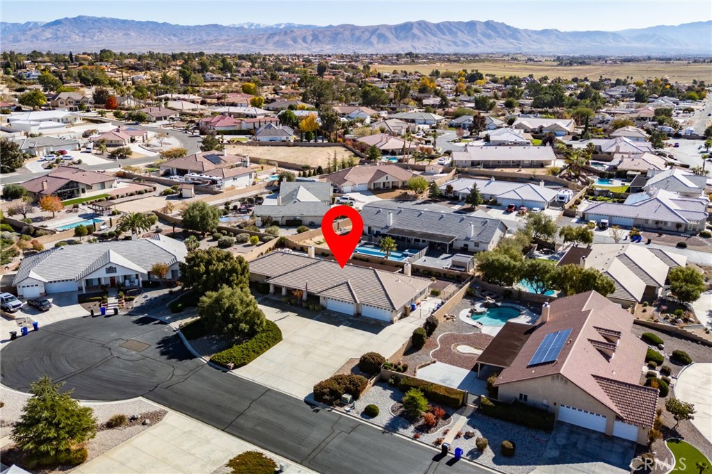 19783 Lara Lane Apple Valley, CA 92308 - Photo 5 of 42 an aerial view of a houses with a yard