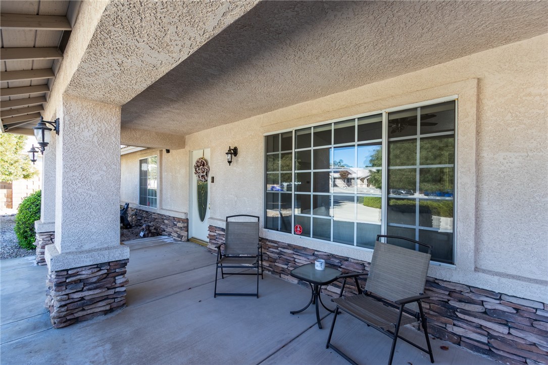19783 Lara Lane Apple Valley, CA 92308 - Photo 9 of 42 a building outdoor space with patio furniture