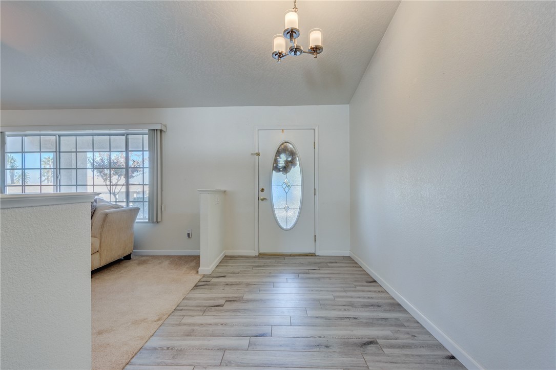 19783 Lara Lane Apple Valley, CA 92308 - Photo 10 of 42 a view of livingroom with hardwood