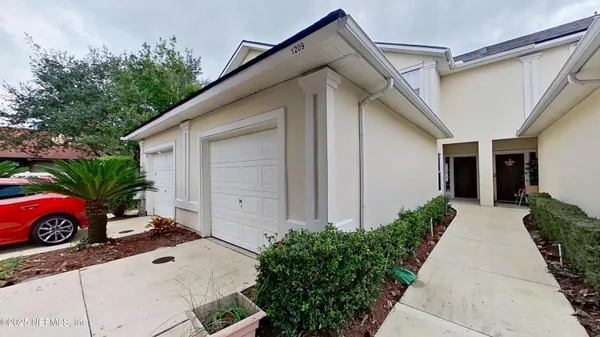 a house view with a outdoor space