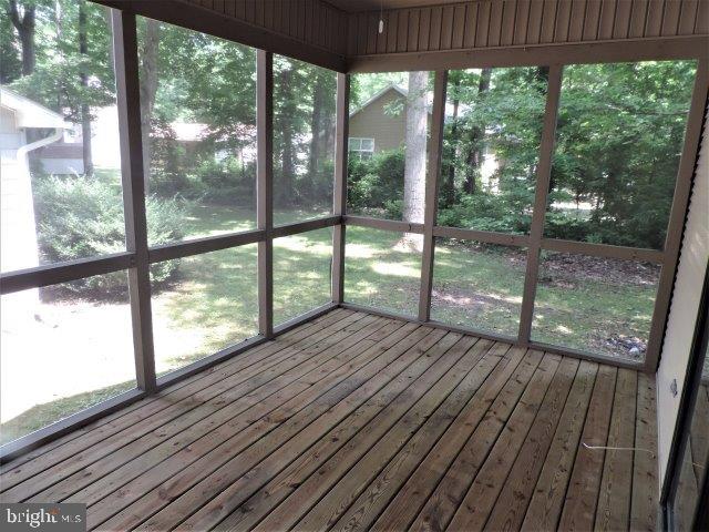 51 Windjammer Road Ocean Pines, MD 21811 - Photo 3 of 23 a view of a wooden deck with a yard