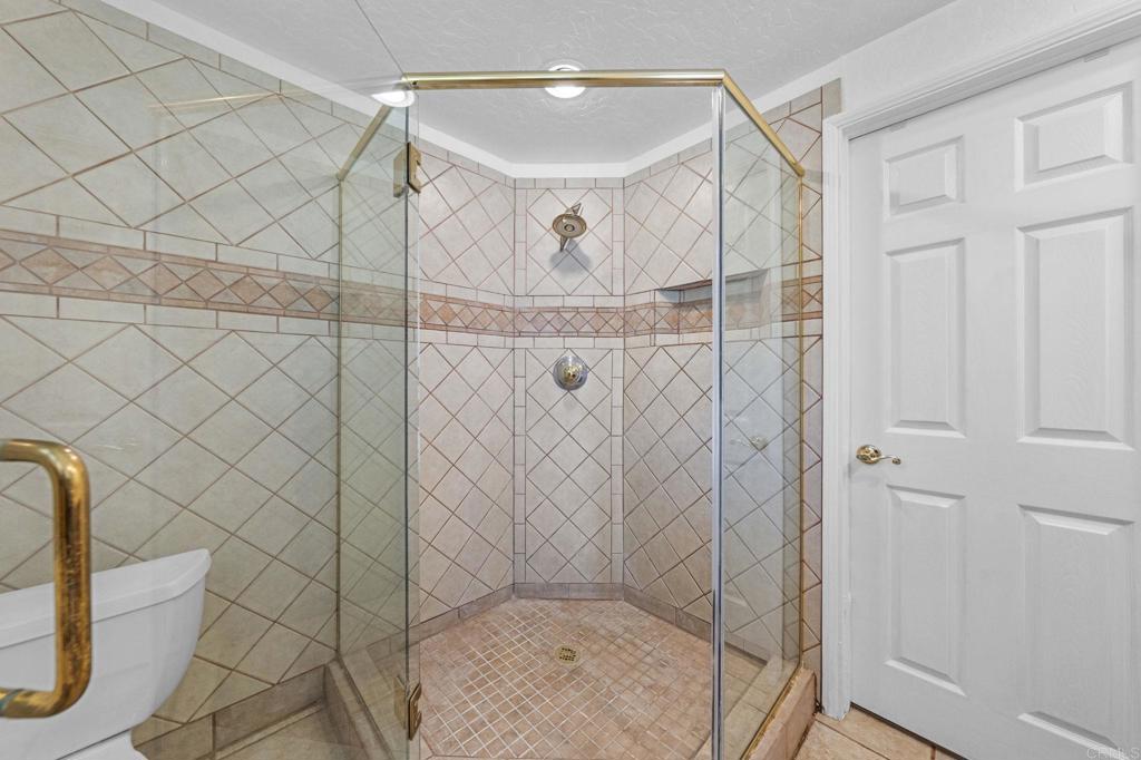 30265 Miller Road Valley Center, CA 92082 - Photo 23 of 56 a bathroom with a shower and a sink