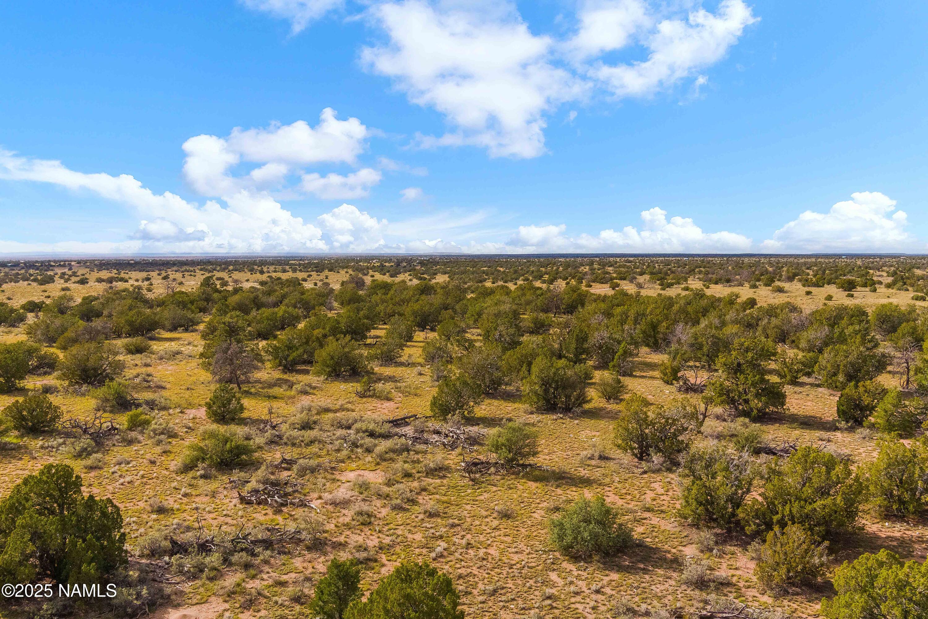 3697 East S Rim Ranch Road, Unit C Williams, AZ 86046 - Photo 21 of 48 a view of city and ocean