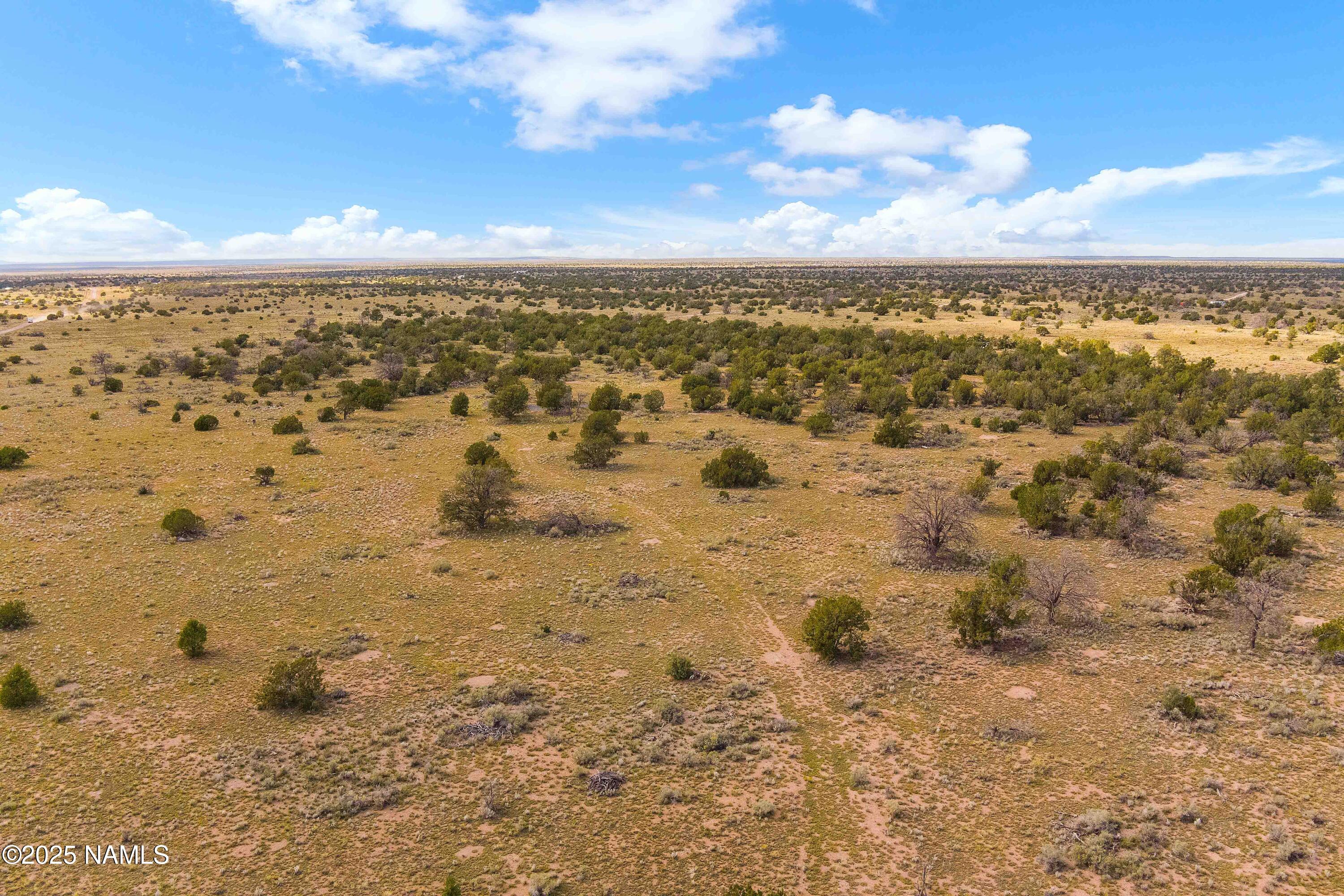 3697 East S Rim Ranch Road, Unit C Williams, AZ 86046 - Photo 35 of 48 a view of city and ocean