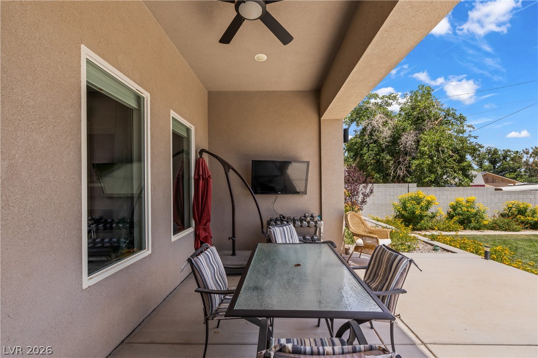 3020 Hannig Street Logandale, NV 89021 - Photo 63 of 75 An inviting outdoor patio, perfect for alfresco dining and relaxation, opens onto a well-kept yard.