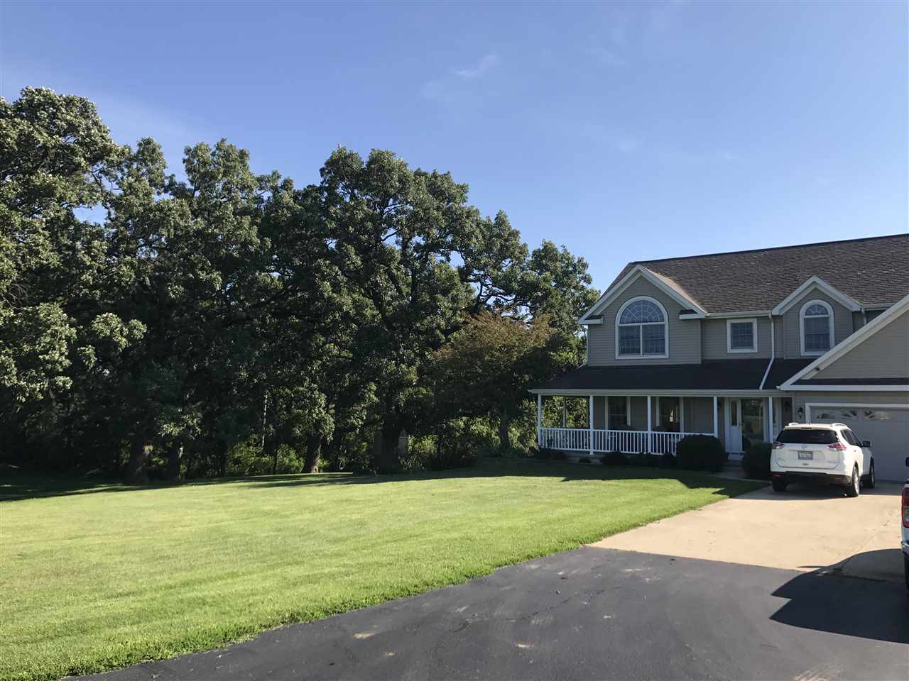 560 Rolling Hills Road Dixon, IL 61021 - Photo 1 of 3 a view of a house with a swimming pool