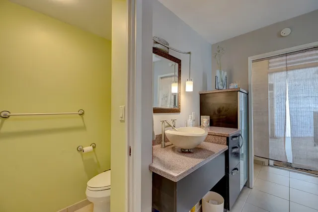 a view of a bathroom with a sink and a toilet