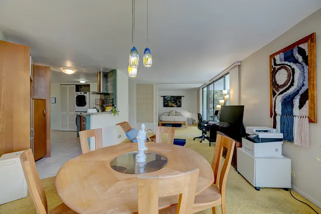a living room with fireplace furniture and a flat screen tv