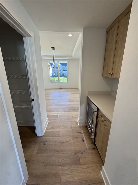12 Old County Road, Unit 20 Hudson, MA 01749 - Photo 19 of 30 a view of a hallway with wooden floor and staircase