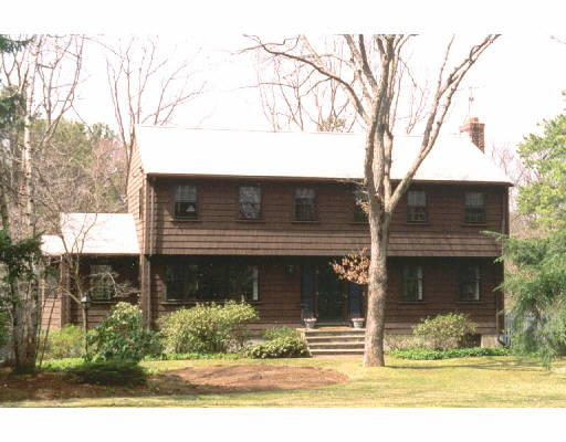 203 Hickory Road Weston, MA 02493 - Photo 1 of 1 a front view of a house with garden