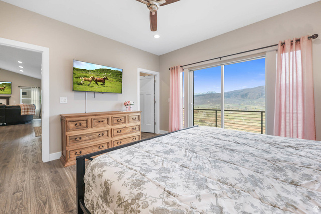 4527 North Seven Bridges Road Eden, UT 84310 - Photo 20 of 65 Bedroom featuring access to exterior, dark wood-style flooring, recessed lighting, and ceiling fan