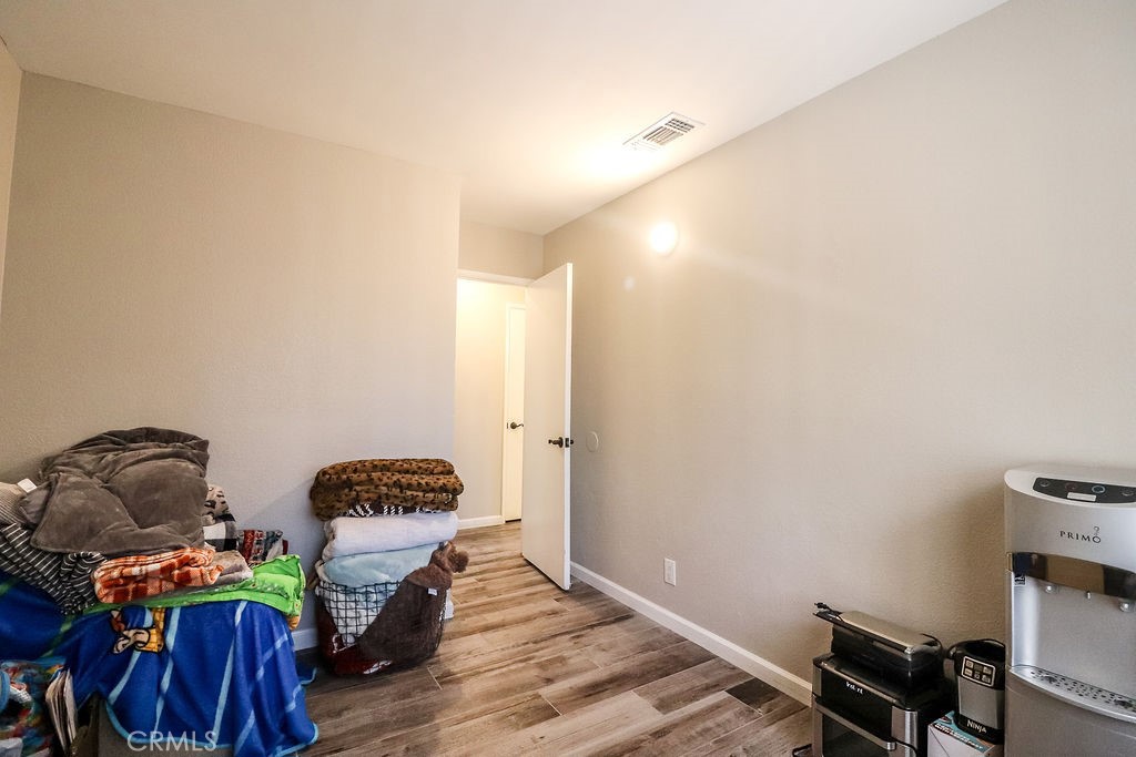 1330 Santa Fe Circle Needles, CA 92363 - Photo 16 of 28 a living room with furniture and a window