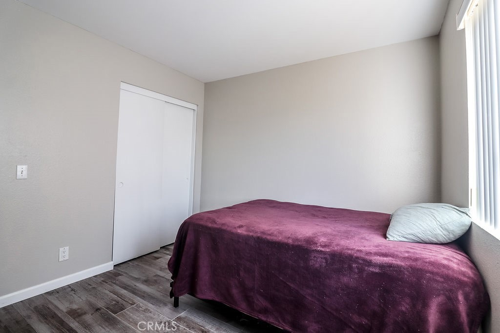 1330 Santa Fe Circle Needles, CA 92363 - Photo 17 of 28 a bedroom with a bed and a window