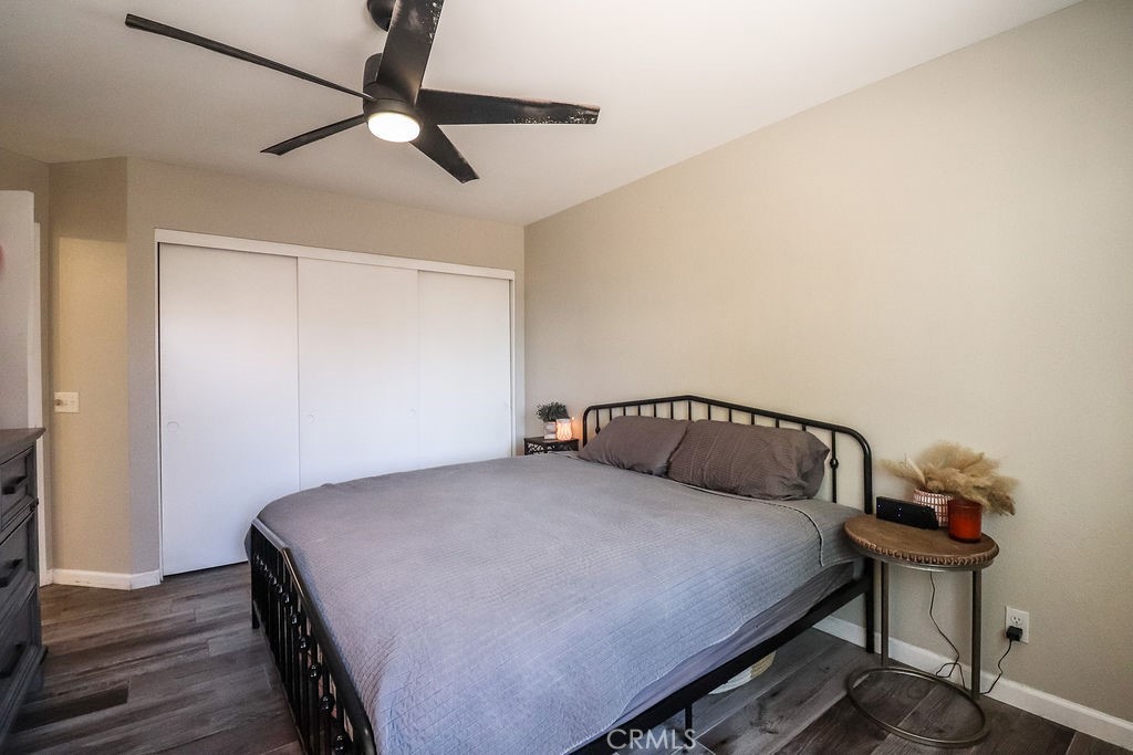 1330 Santa Fe Circle Needles, CA 92363 - Photo 23 of 28 a bedroom with a bed and a table