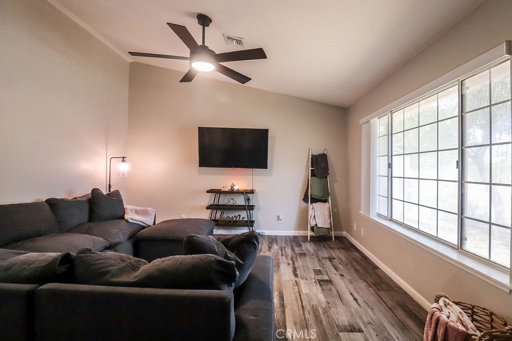 1330 Santa Fe Circle Needles, CA 92363 - Photo 4 of 28 a living room with furniture and a flat screen tv