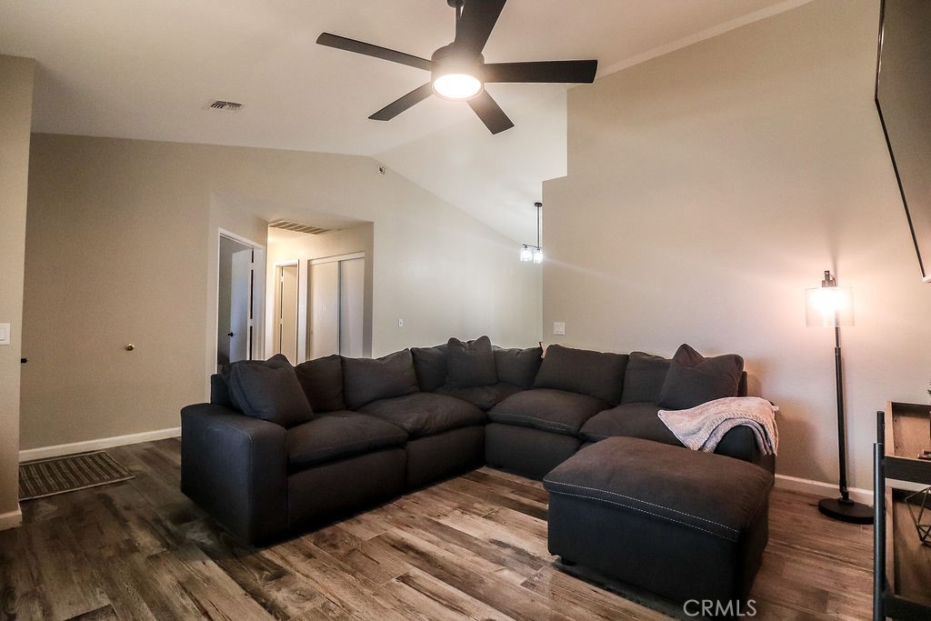 1330 Santa Fe Circle Needles, CA 92363 - Photo 6 of 28 a living room with furniture and a couch