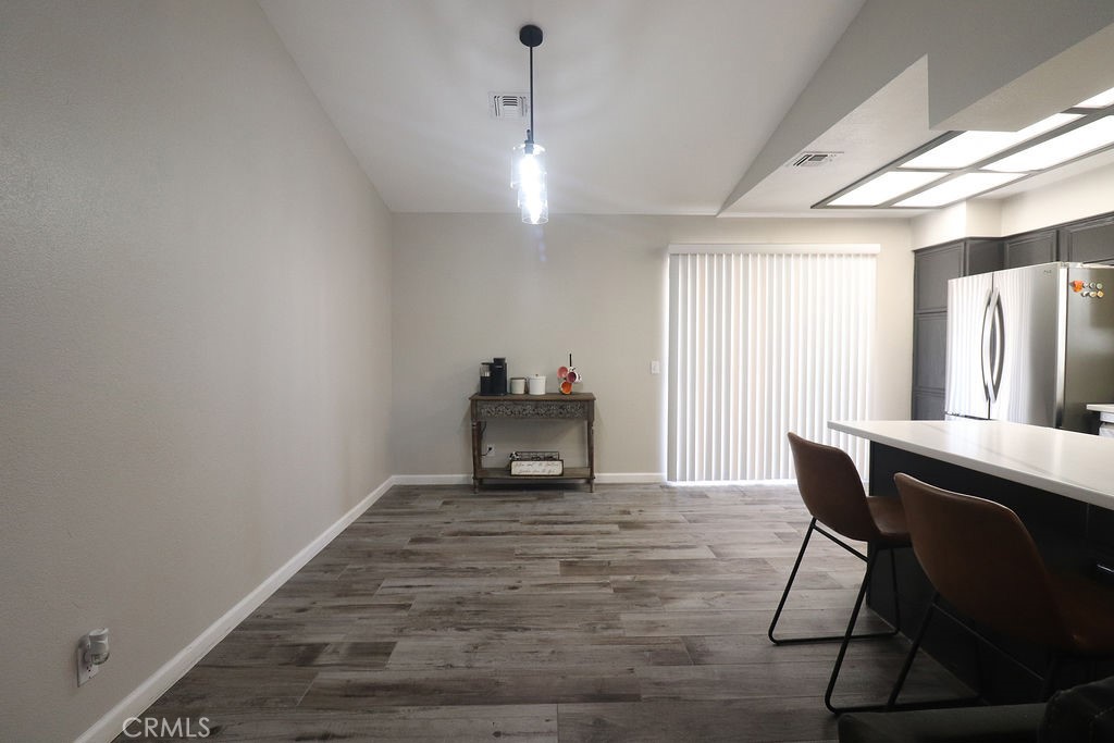 1330 Santa Fe Circle Needles, CA 92363 - Photo 9 of 28 a view of a room with furniture and a chandelier
