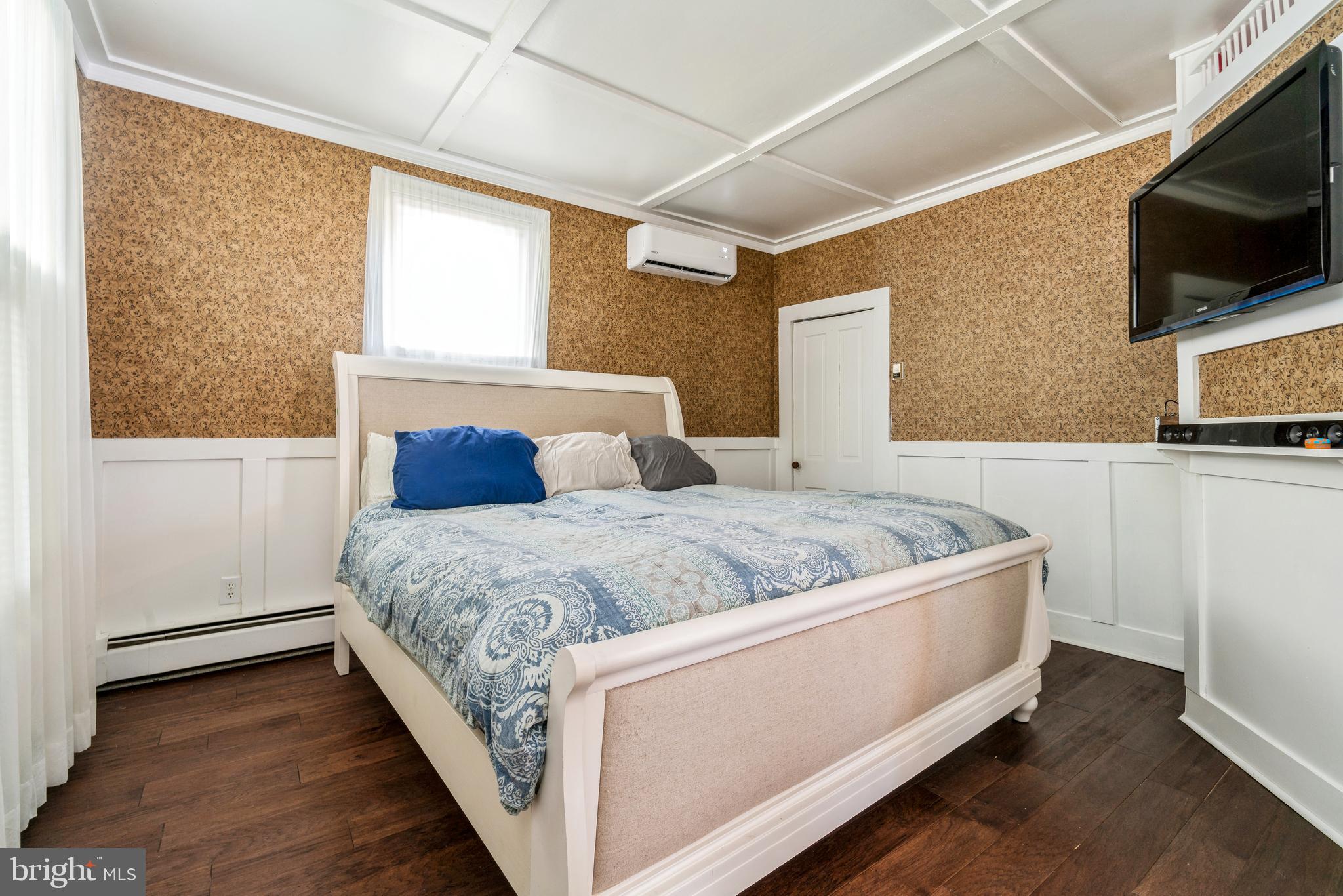 212 Maple Avenue Ridgely, MD 21660 - Photo 16 of 41 Main Level Primary Bedroom w/ Coffered Ceiling