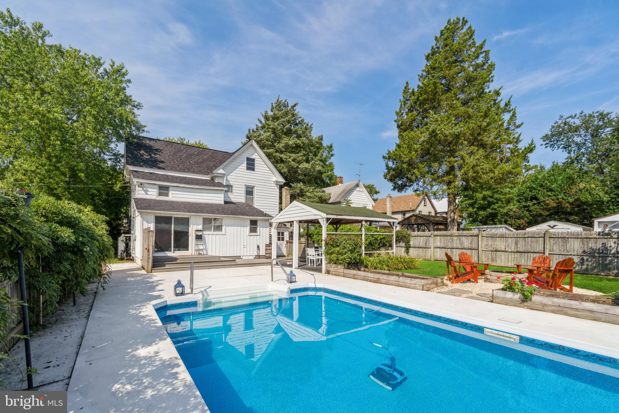 212 Maple Avenue Ridgely, MD 21660 - Photo 27 of 41 Sparkling In-Ground Pool w/ Patio Surround