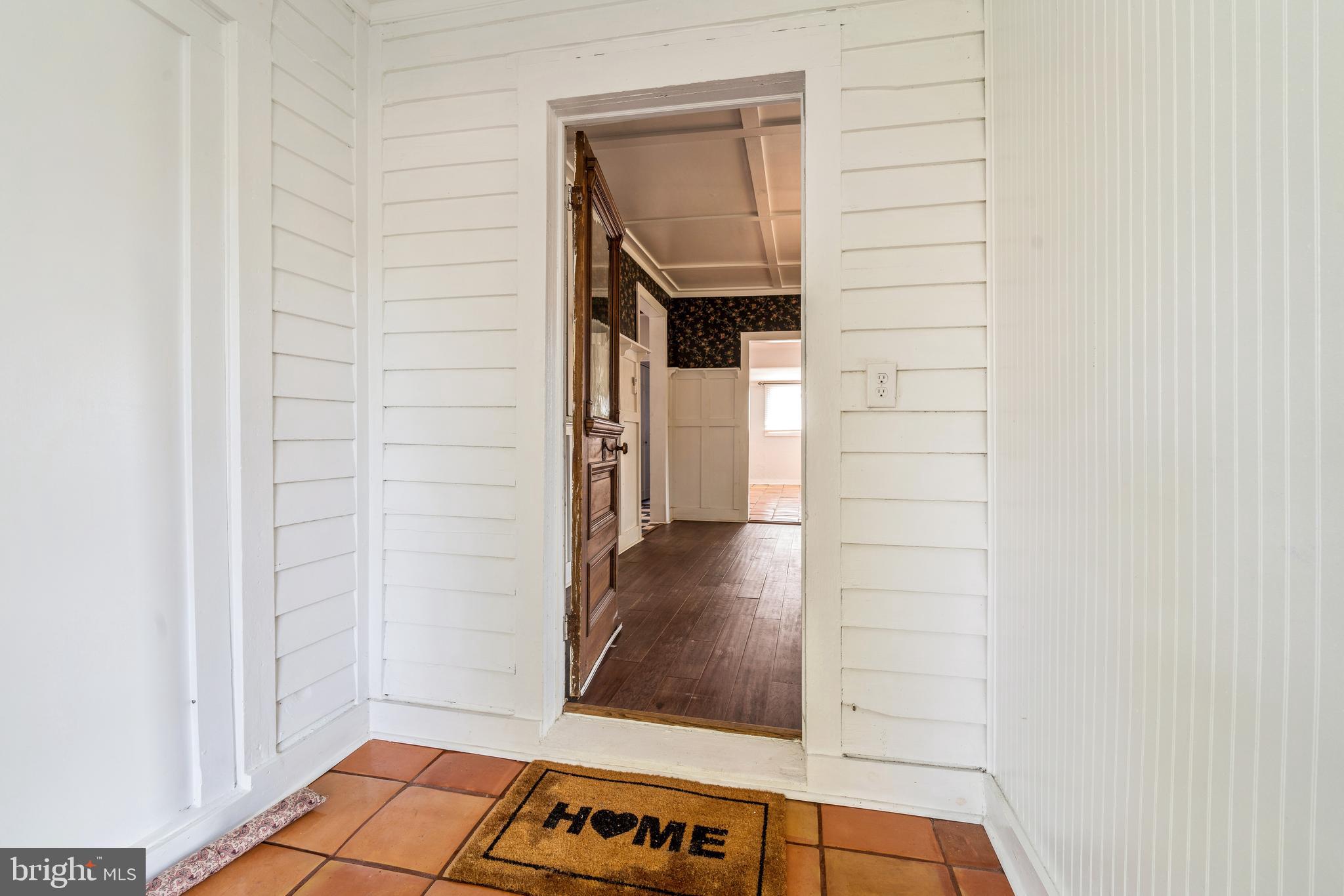 212 Maple Avenue Ridgely, MD 21660 - Photo 5 of 41 Breadboard & Shiplap Walls in this Inviting Foyer!