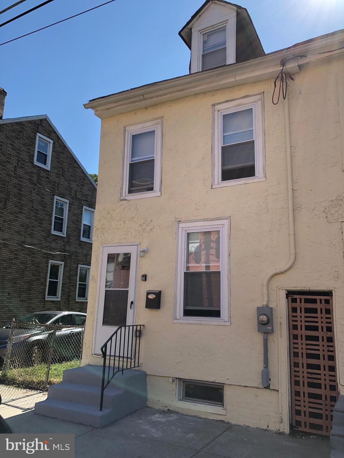 322 Ridgeway Street Gloucester City, NJ 08030 - Photo 22 of 22 a front view of a house with a yard