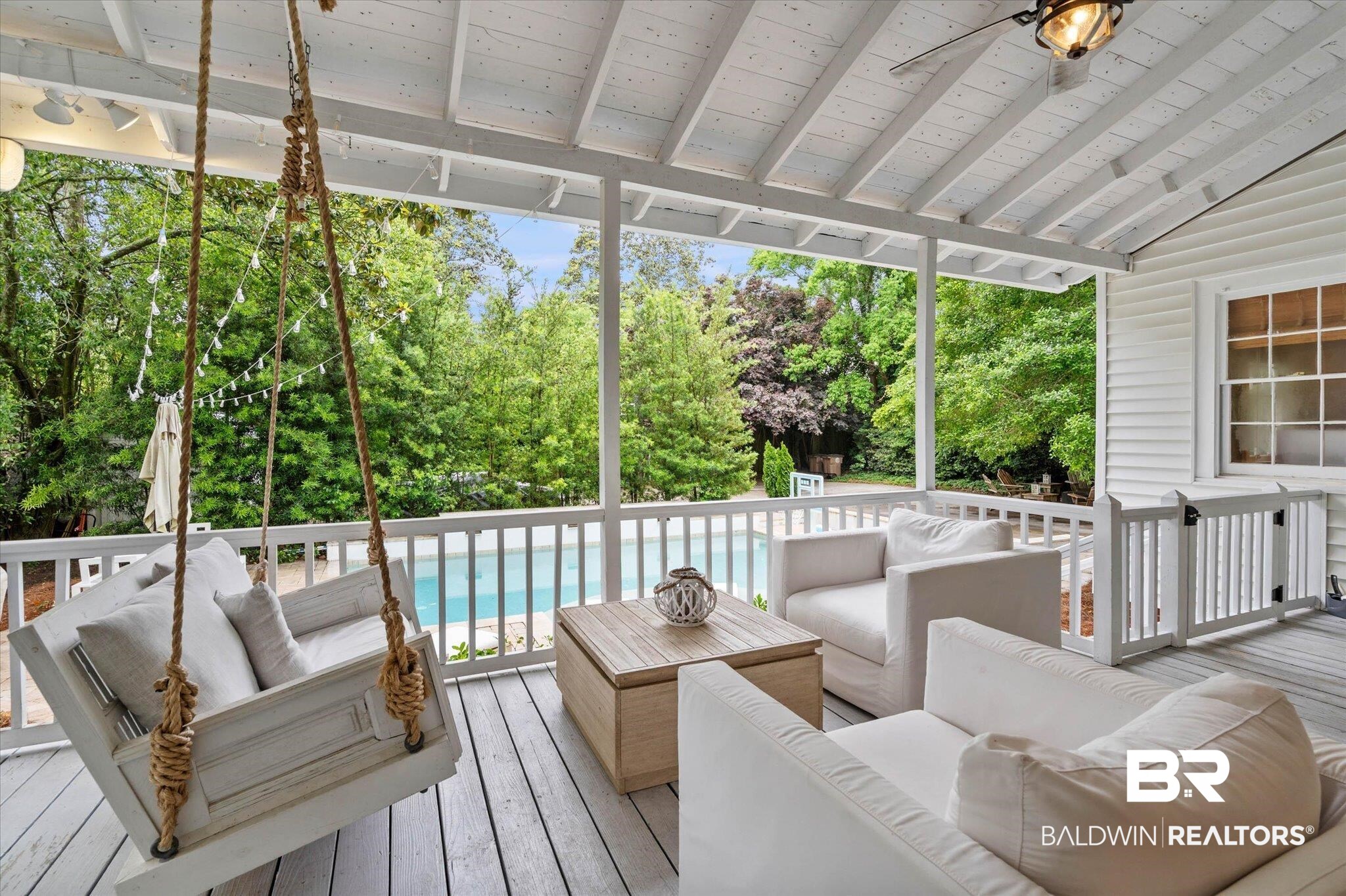 3863 Old Shell Road Mobile, AL 36608 - Photo 32 of 48 Expansive covered porch featuring a white planked ceiling, painted wood flooring, and white railing
