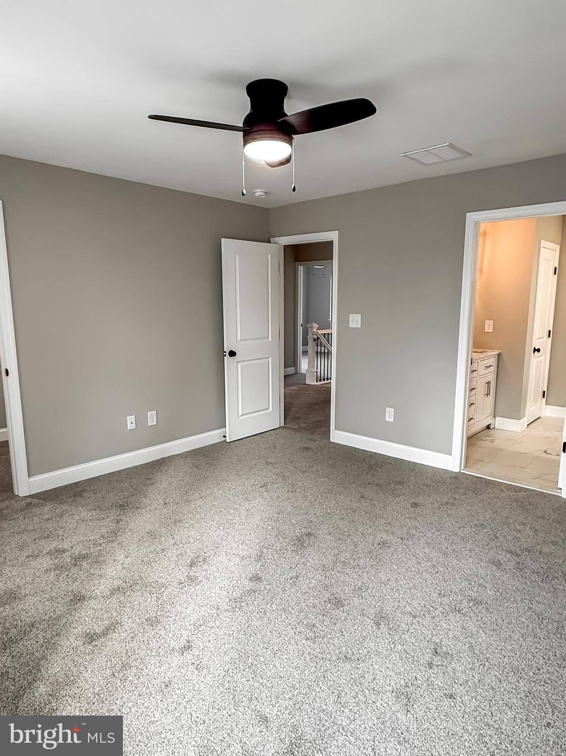 702 Delaware Avenue Riverside, NJ 08075 - Photo 12 of 15 a view of an empty room with a ceiling fan