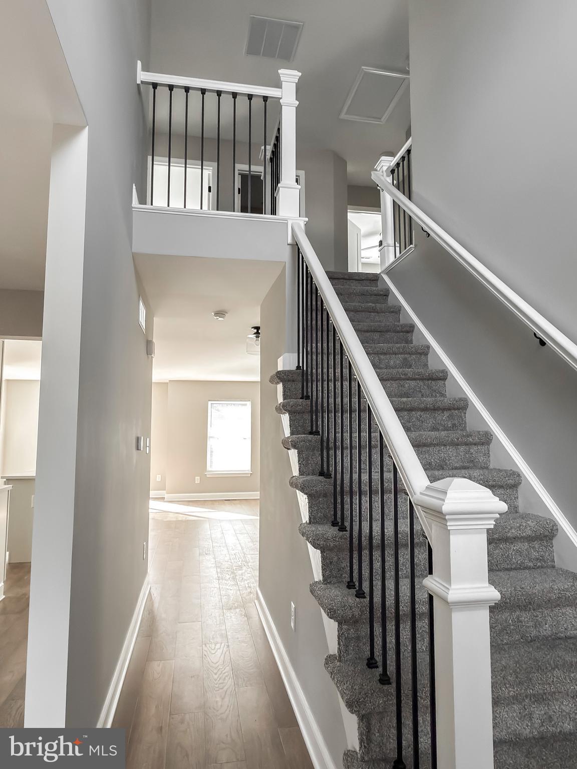 702 Delaware Avenue Riverside, NJ 08075 - Photo 9 of 15 a view of entryway and hall with wooden floor