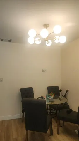 a view of a workspace with furniture