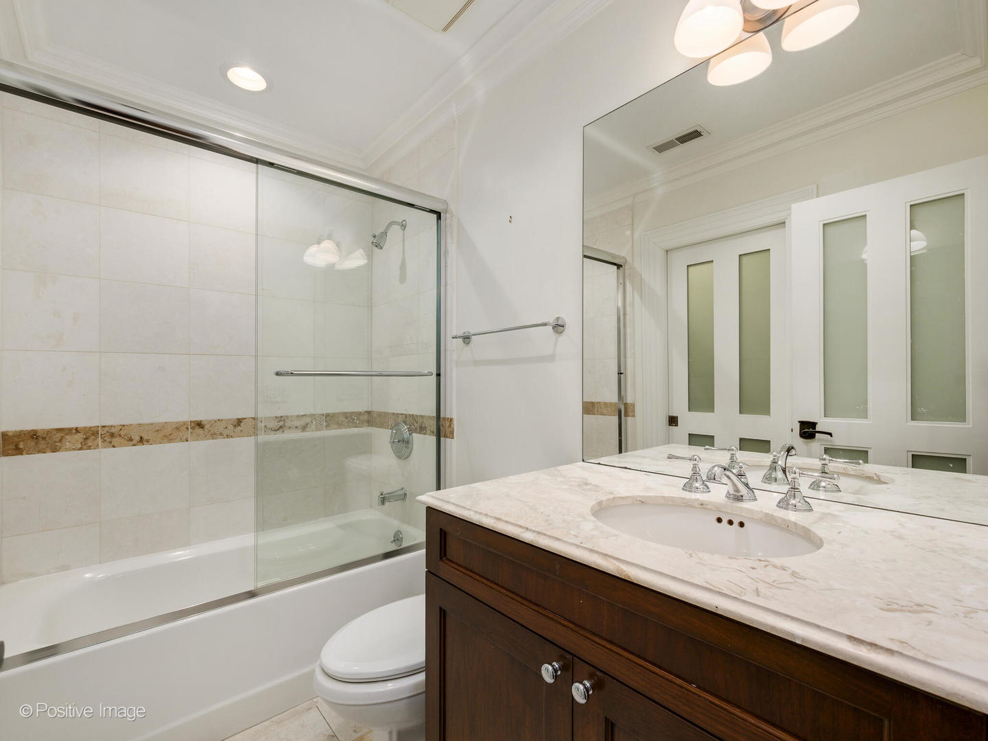 37 East Elm Street Chicago, IL 60611 - Photo 32 of 32 a bathroom with a granite countertop sink a toilet and shower