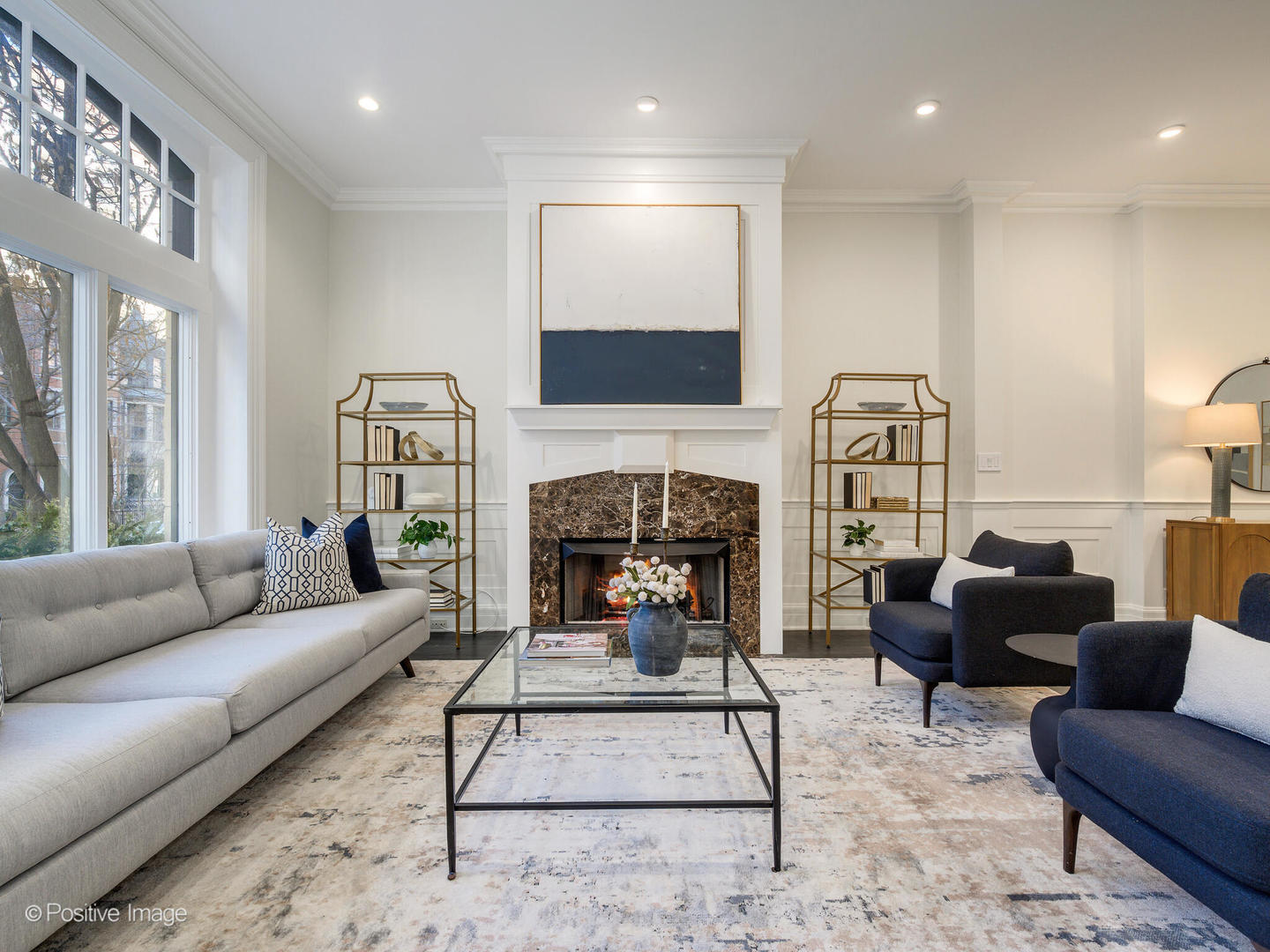 37 East Elm Street Chicago, IL 60611 - Photo 4 of 32 a living room with furniture a rug and a fireplace