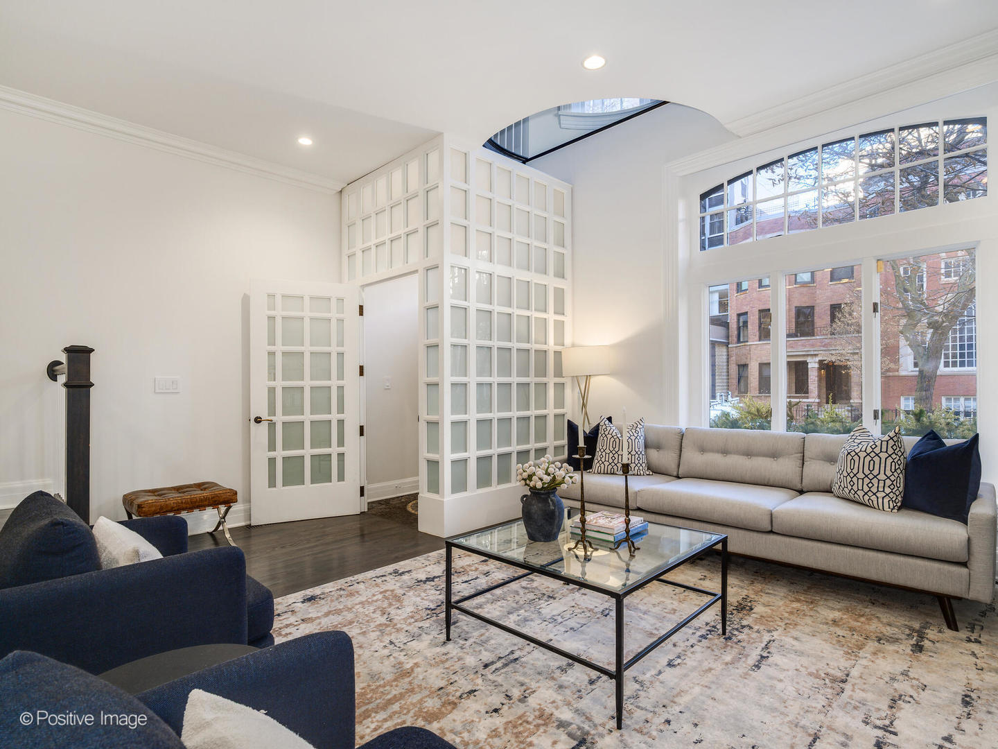 37 East Elm Street Chicago, IL 60611 - Photo 5 of 32 a living room with furniture and a floor to ceiling window