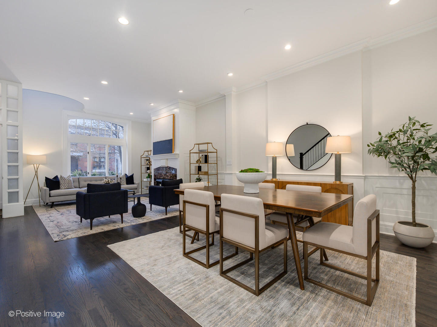 37 East Elm Street Chicago, IL 60611 - Photo 6 of 32 a living room with furniture a glass table and kitchen view