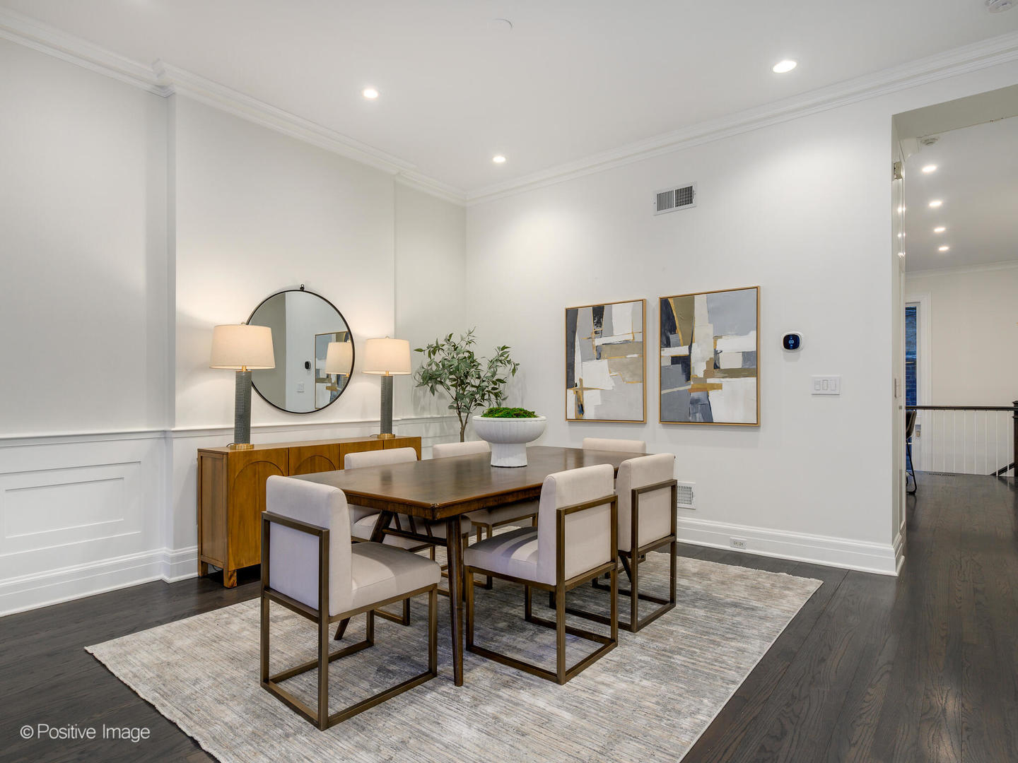37 East Elm Street Chicago, IL 60611 - Photo 7 of 32 a view of a dining room with furniture and wooden floor