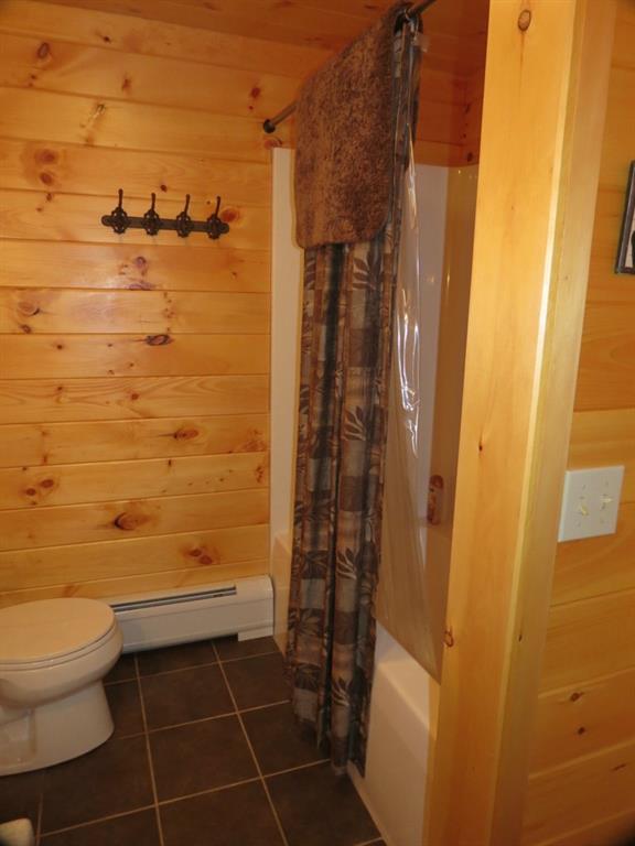 90 Big Woods Road Harrison, ME 04040 - Photo 25 of 34 Basement full bath showing tub