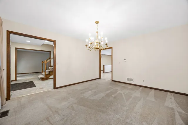 a view of a livingroom with a chandelier