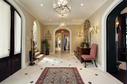 175 Sheridan Road Winnetka, IL 60093 - Photo 2 of 16 a living room with furniture a piano and a flat screen tv