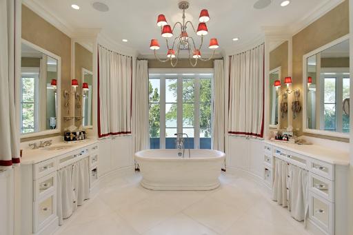 175 Sheridan Road Winnetka, IL 60093 - Photo 11 of 16 a spacious bathroom with sinks mirror and a bathtub