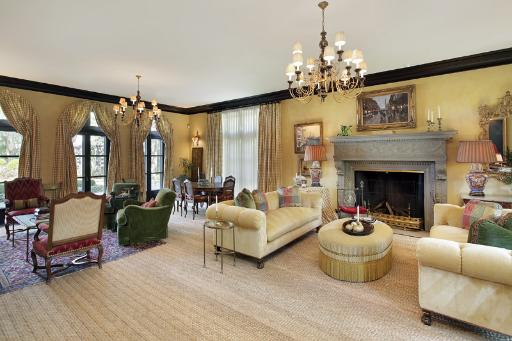 175 Sheridan Road Winnetka, IL 60093 - Photo 3 of 16 a living room with furniture and a fireplace