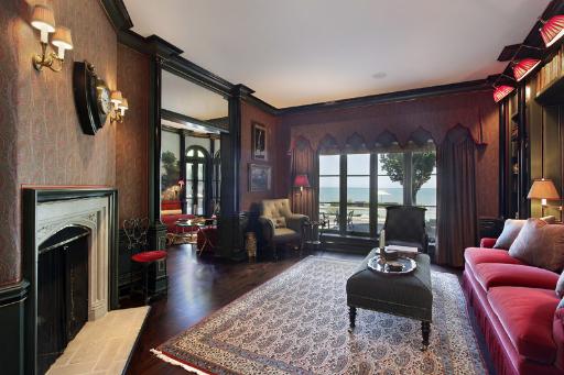 175 Sheridan Road Winnetka, IL 60093 - Photo 5 of 16 a living room with furniture fireplace and a large window